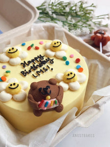 3D- Daisy Bear holding cake